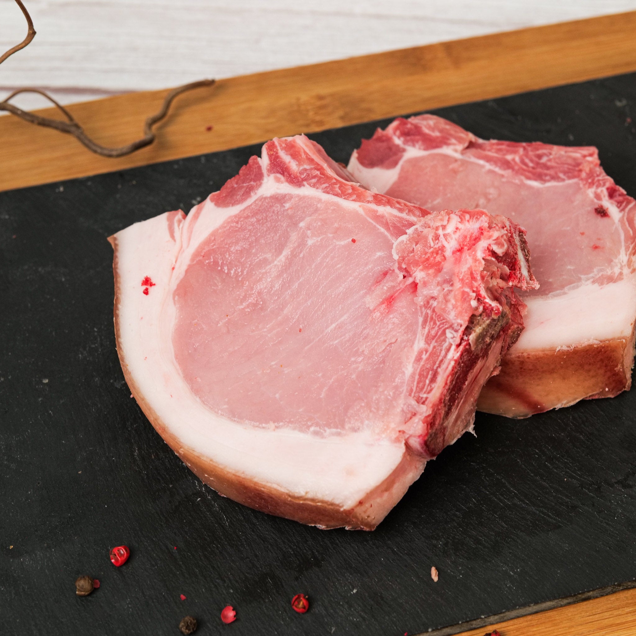 Bistecche o Costata di Suino con Cotenna