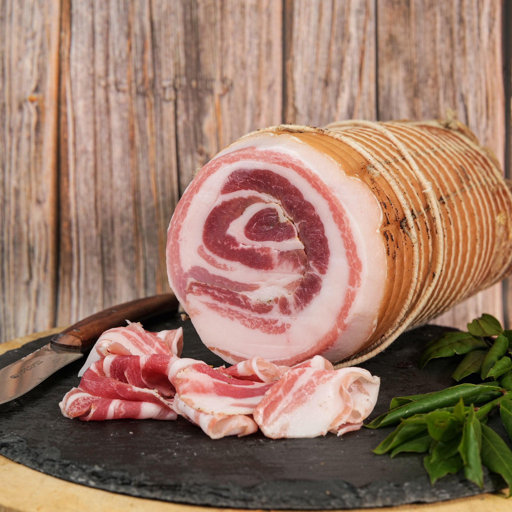 PANCETTA DI MAIALE ARROTOLATA SPEZIATA – SALUMERIA BENVENUTI